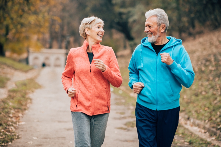 happy couple jogging