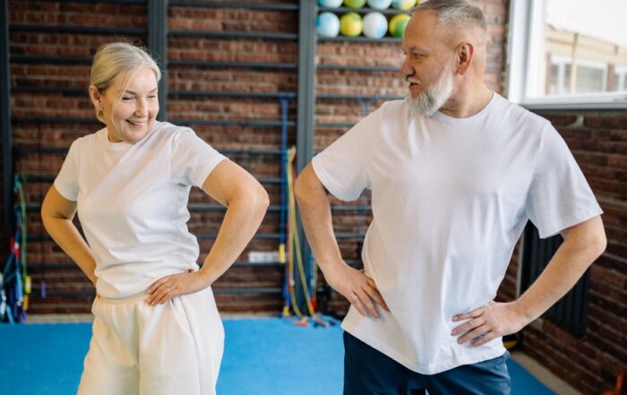 happy couple doing yoga